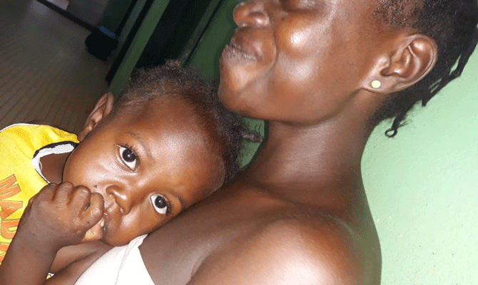 ESPOIR, RECOVERING FROM MALARIA AT TWO YEARS OLD